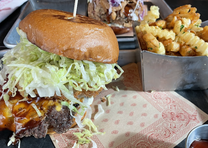 Guy Fieri’s Vegas Kitchen and Bar signature dishes Trash Can Nachos
Mac-N-Cheese Burger
Bacon Mac-N-Cheese